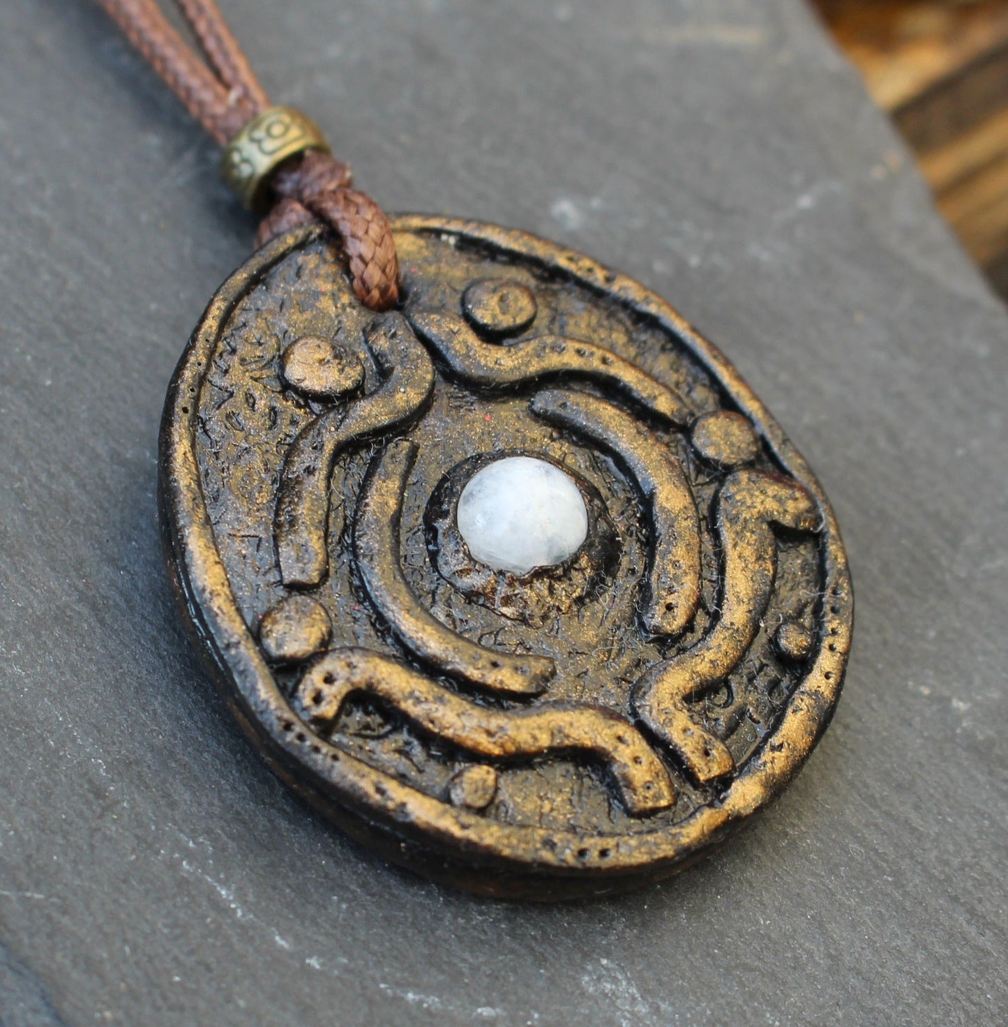 Handmade Ancient Moonstone amulet necklace with an antique bronze finish