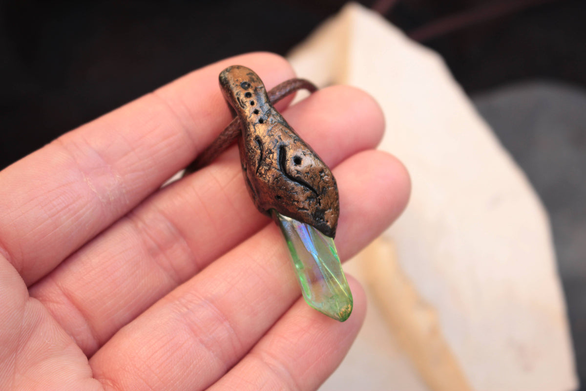 Fantasy pendant inspired by a green tear from an ancient tree