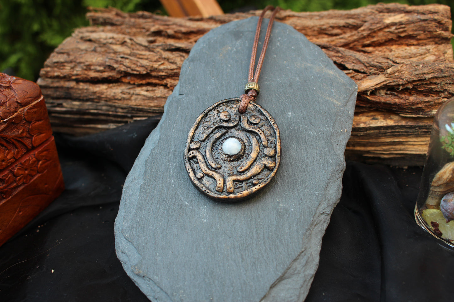 Fantasy pendant with an antique bronze look and natural Moonstone
