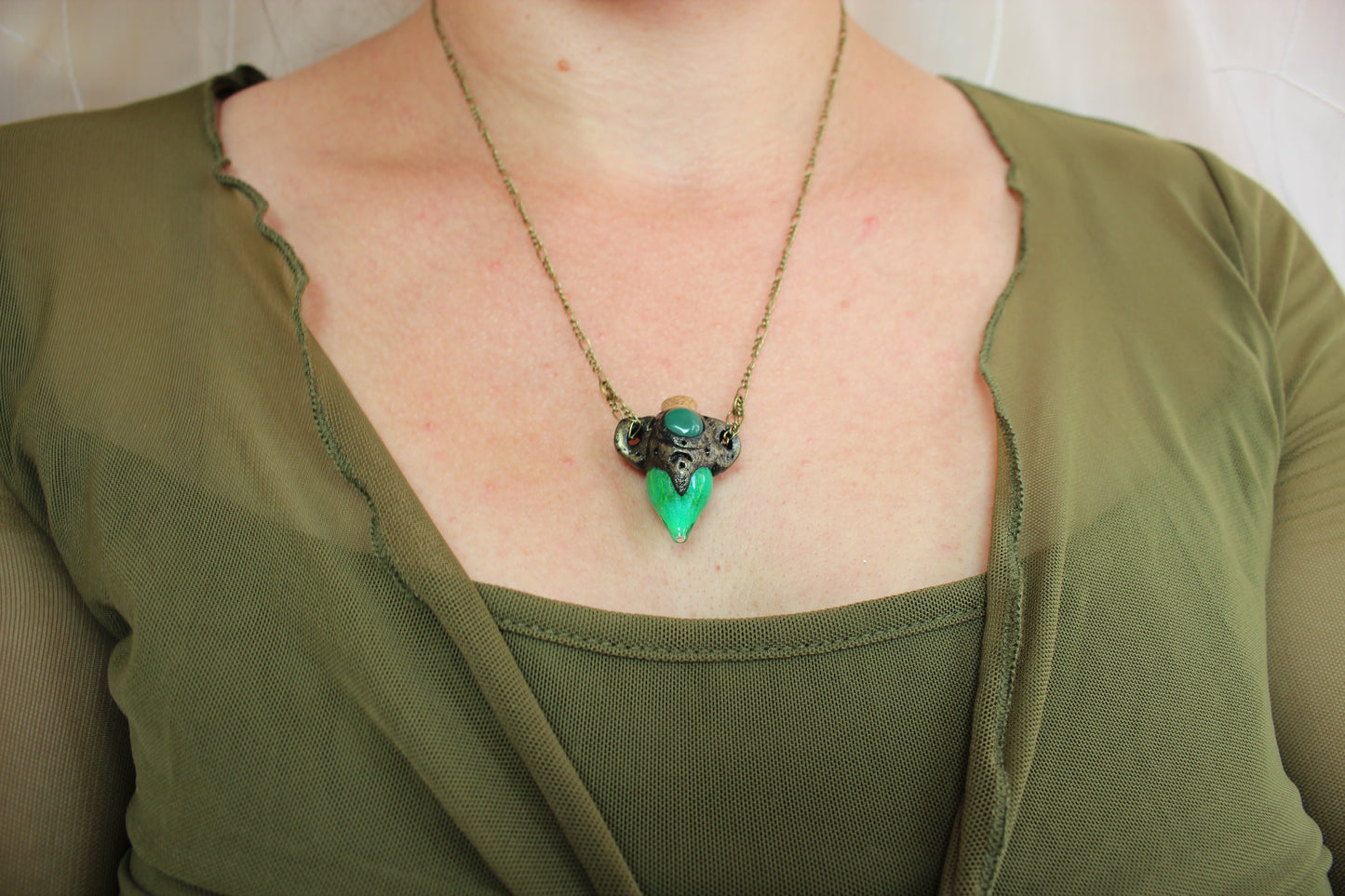 Ancient bronze style potion pendant handcrafted from polymer clay