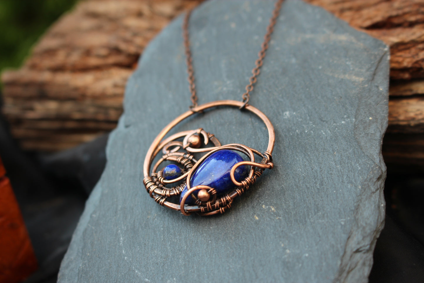 Artisan crafted wire wrapped pendant made with copper and natural gemstone