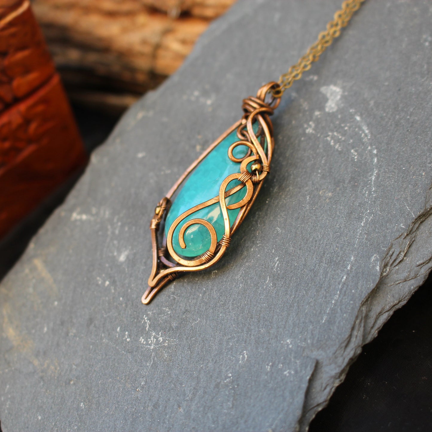 Handmade blue agate wire wrapped necklace with fantasy inspired copper pendant