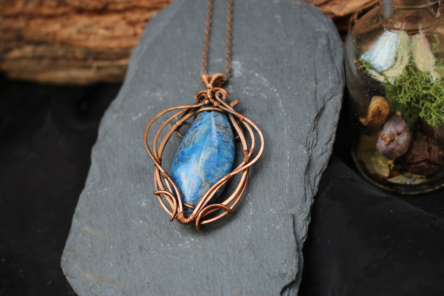 Artisan blue crazy agate pendant featuring elegant copper wire wrapping