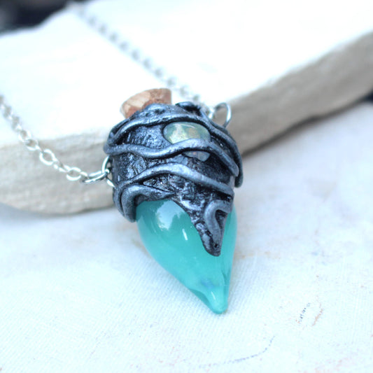 Turquoise glowing bottle necklace with gemstone and silver chain