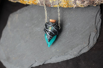 Blue glowing magic bottle necklace with sterling silver chain