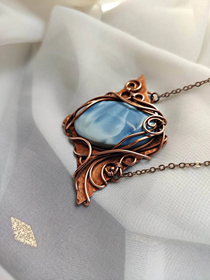 Elegant blue opal gemstone necklace with handcrafted copper wire wrapping