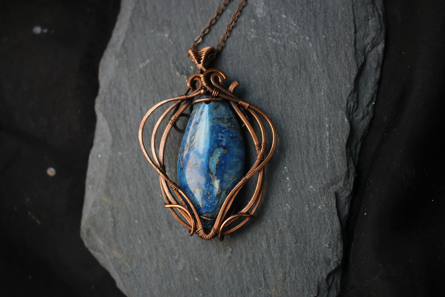 Elegant blue crazy agate pendant wrapped with copper wire for boho style
