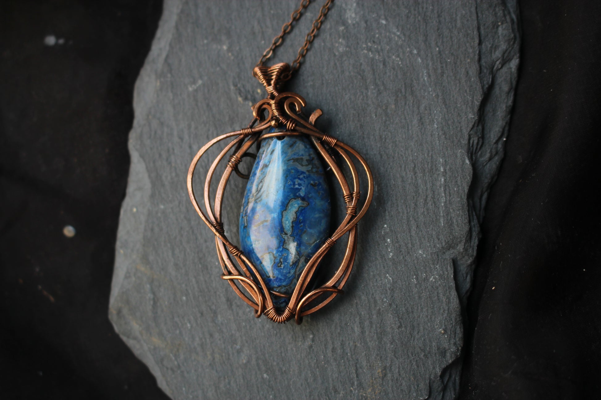 Elegant blue crazy agate pendant wrapped with copper wire for boho style