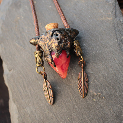 Handmade fantasy potion necklace with crimson vial pendant and feather charms
