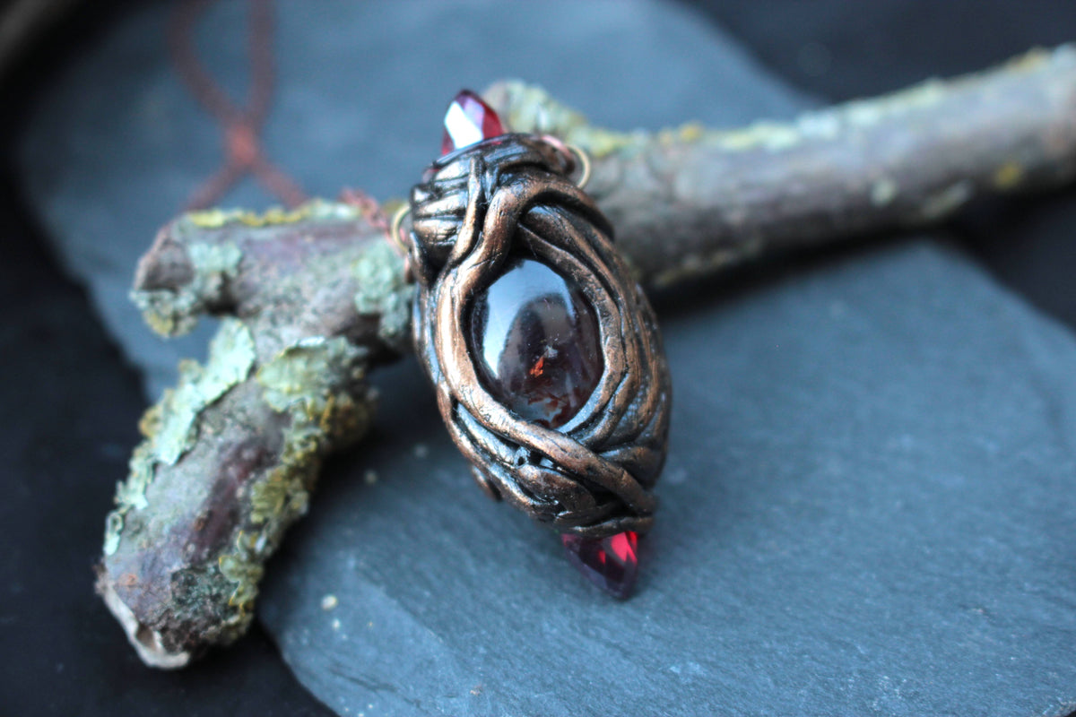 Unique handmade necklace combining polymer clay, crystals and an antique bronze finish