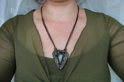 Dark academia style fantasy necklace with ancient look