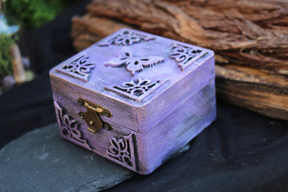 Decorative purple wooden jewelry storage box with gold accents