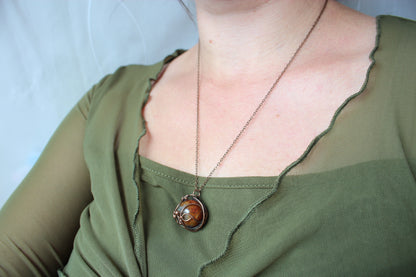 Dragon vein agate stone and intricate copper wire wrapping in handcrafted boho necklace