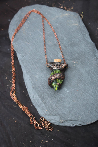 Handmade druid-inspired fantasy necklace with a moss-filled bottle pendant