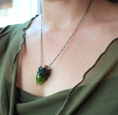 Druid-inspired fantasy necklace featuring a green moss vial
