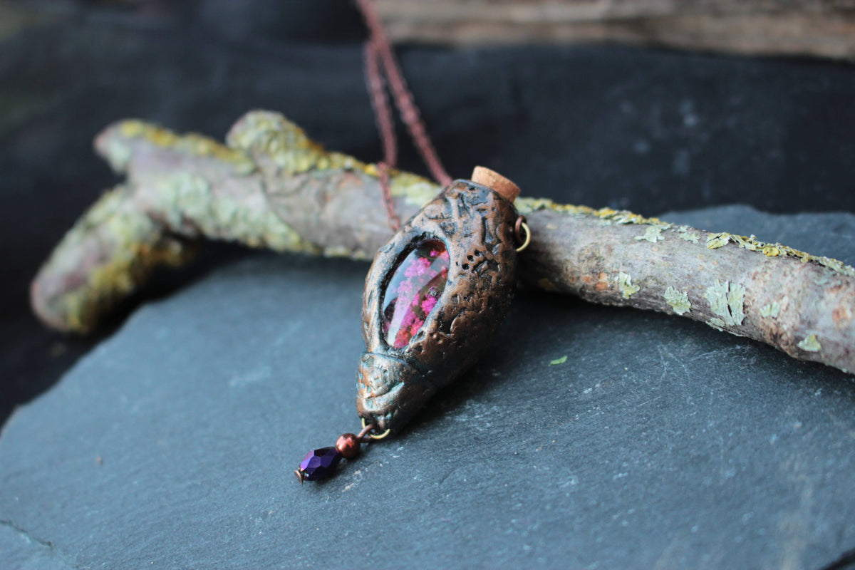 Druid-inspired pendant necklace with a rustic fantasy design