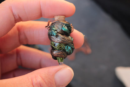 Handmade druid necklace with a tiny magical moss potion pendant