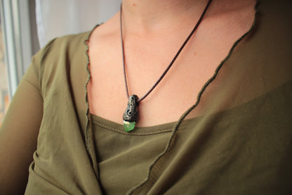Fantasy inspired necklace with an elegant green crystal woodland design