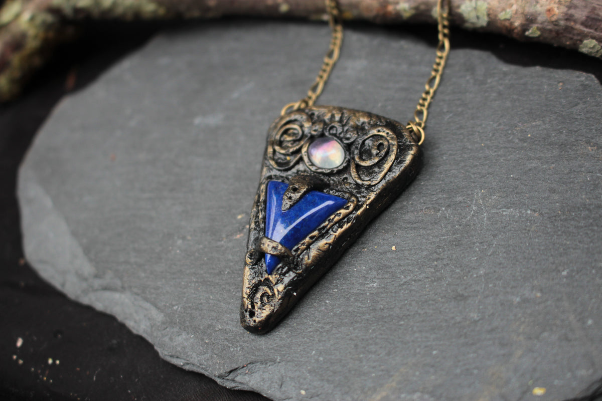 Enchanted blue gemstone talisman necklace handmade with polymer clay