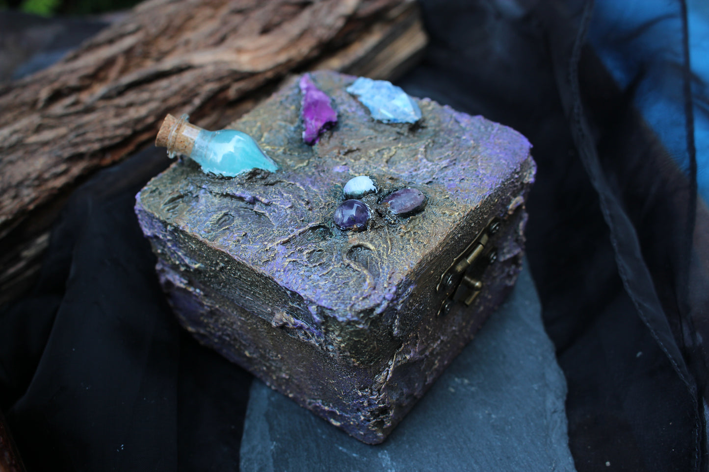 Enchanted witchcore keepsake box with glowing blue potion bottle