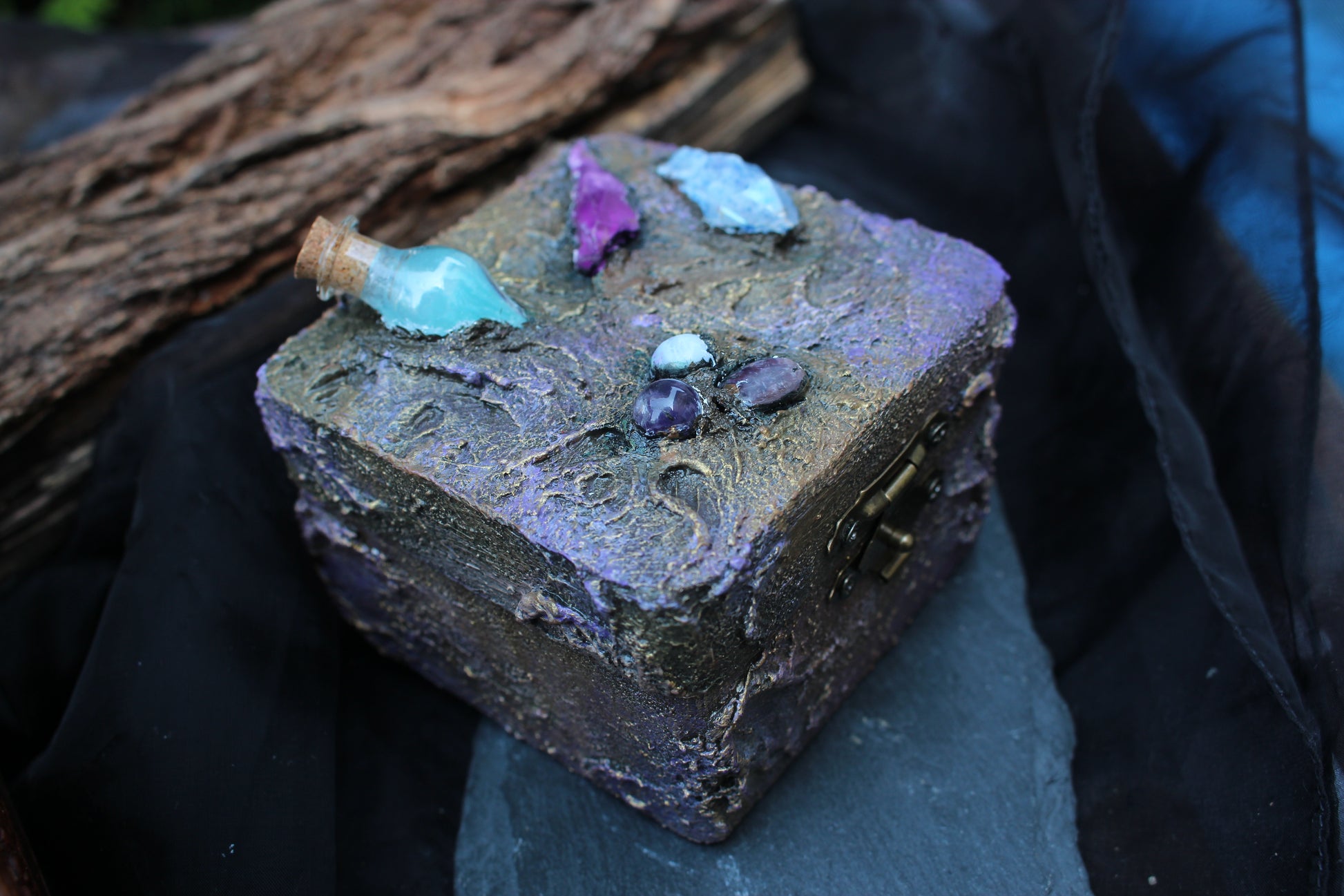 Enchanted witchcore keepsake box with glowing blue potion bottle
