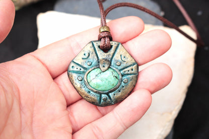 Handmade fantasy artifact necklace with a mysterious ancient relic design