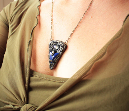 Handmade fantasy blue gemstone pendant with an aged antique appearance