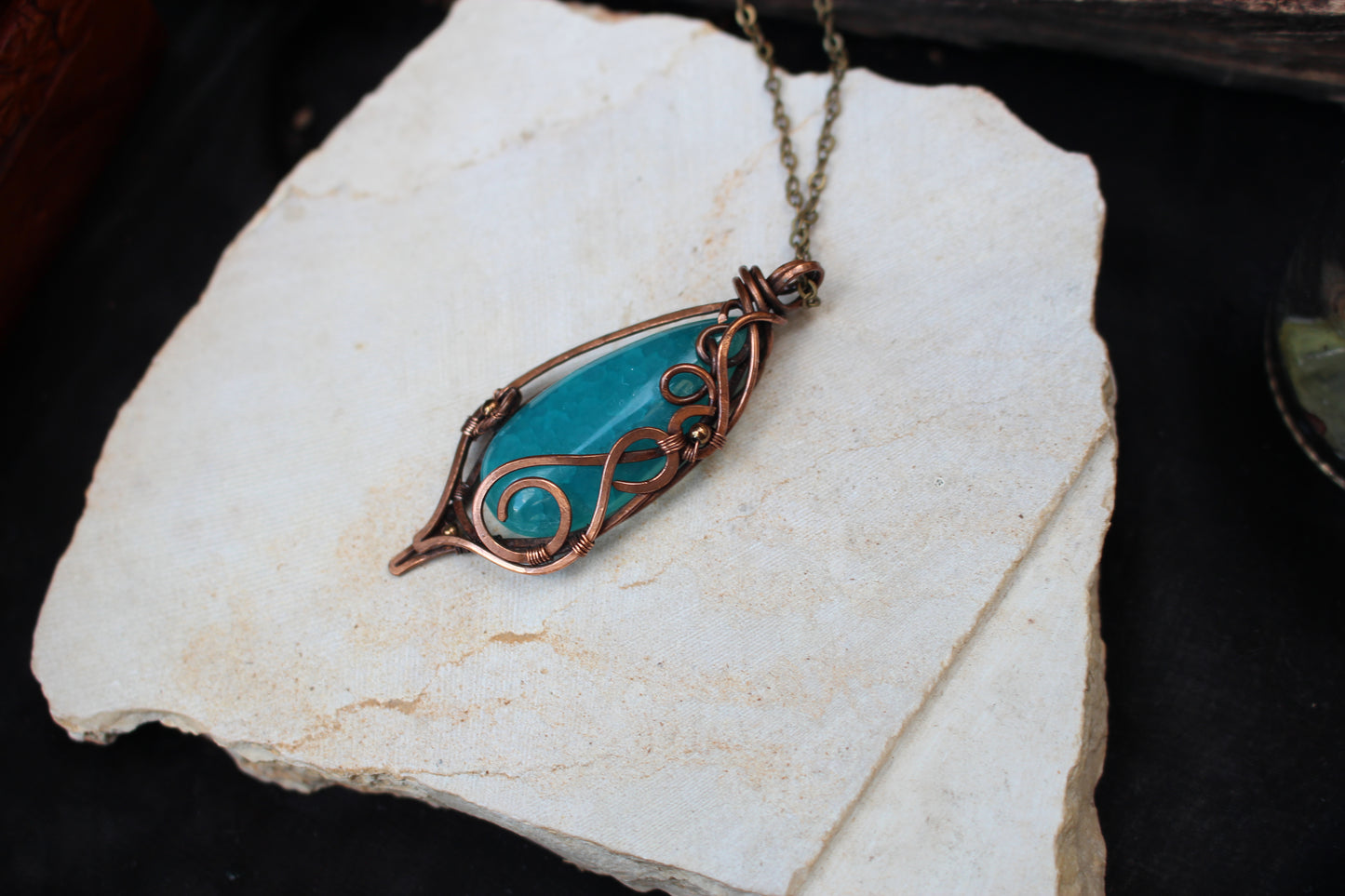 Fantasy style blue agate crystal pendant necklace with artistic copper wire wrap