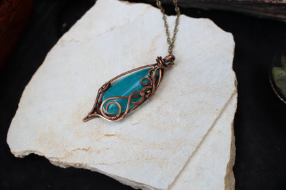 Fantasy style blue agate crystal pendant necklace with artistic copper wire wrap