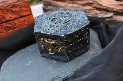 Small fantasy wooden treasure chest with dragon-inspired design