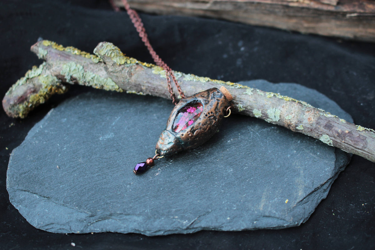 Fantasy necklace featuring a woodland-inspired pendant