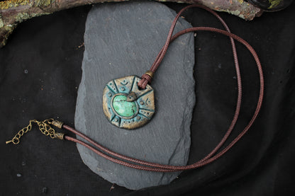 Handmade fantasy pendant showing its approximately 4.2 cm width and 4 cm height