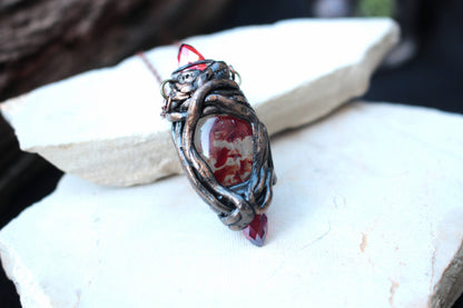 Unique fantasy necklace with deep red crystals and an antique-inspired design