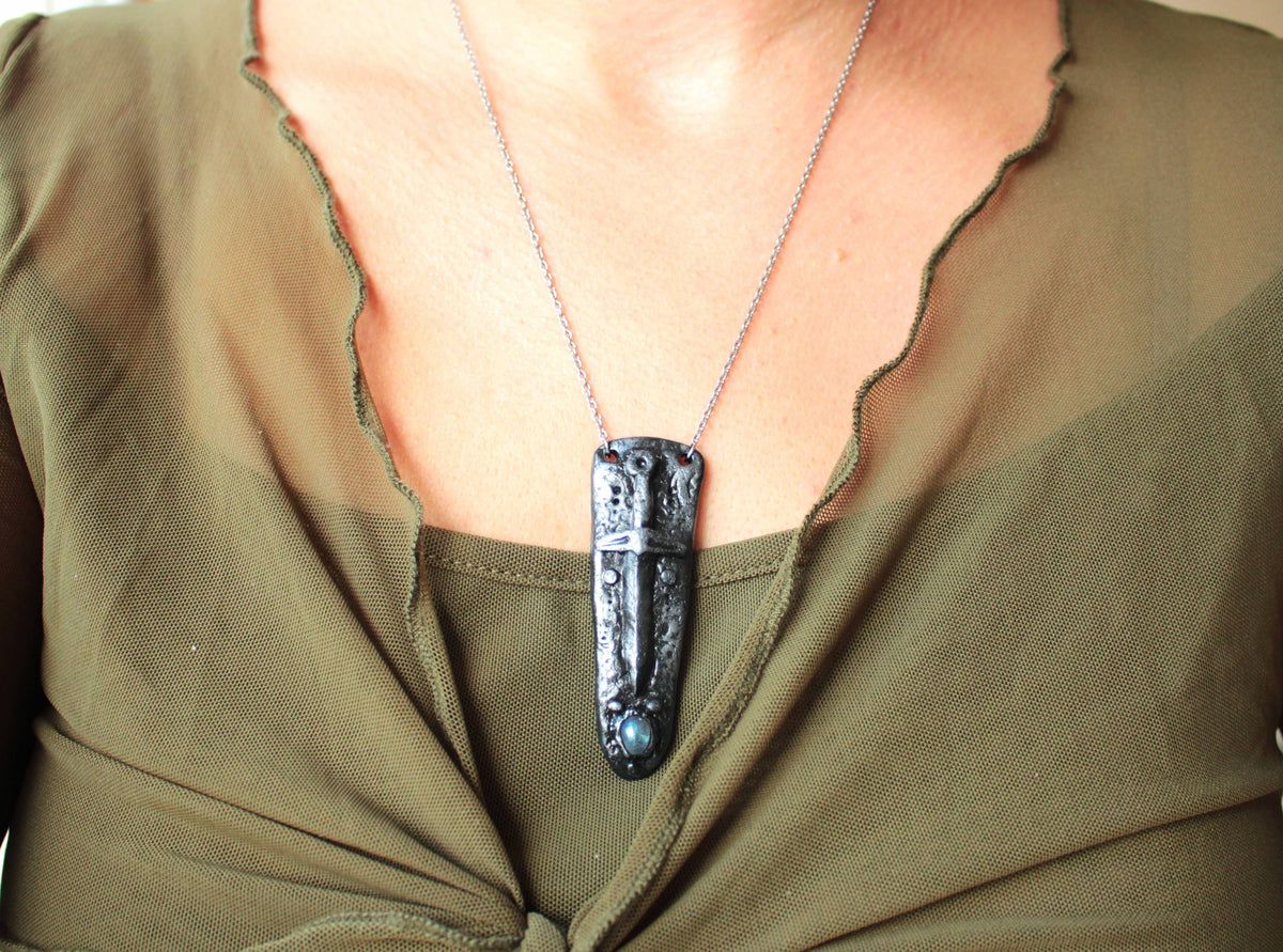Detailed view of the handmade fantasy sword amulet