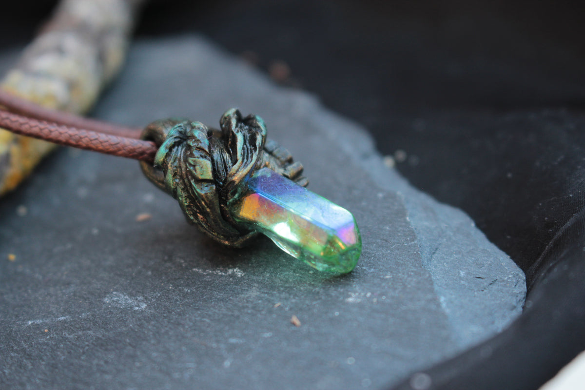 Close-up of the colorful crystal used in the Elarwyn Forest fantasy necklace
