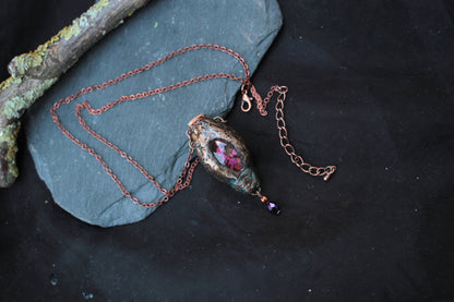 Forest fantasy jewelry featuring a detailed handmade pendant