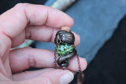 Green fantasy pendant with natural forest-inspired textures and antique copper accents