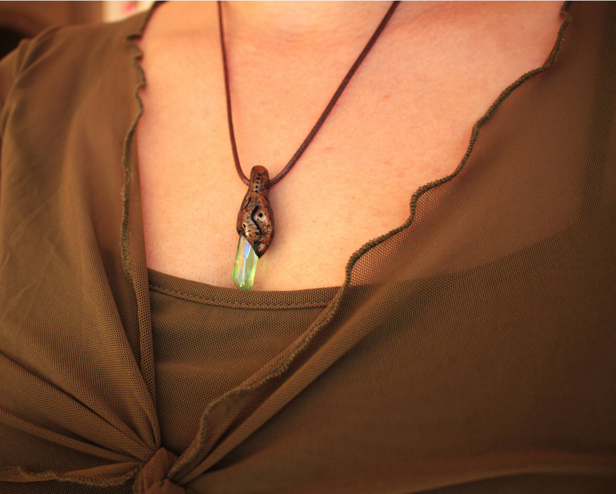 Mystical forest secret pendant with green glowing detail