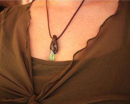 Mystical forest secret pendant with green glowing detail