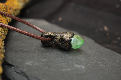 Green crystal pendant inspired by forest spirits and forgotten magic