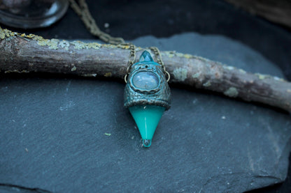 Fantasy pendant necklace with a turquoise glow and mystical potion design