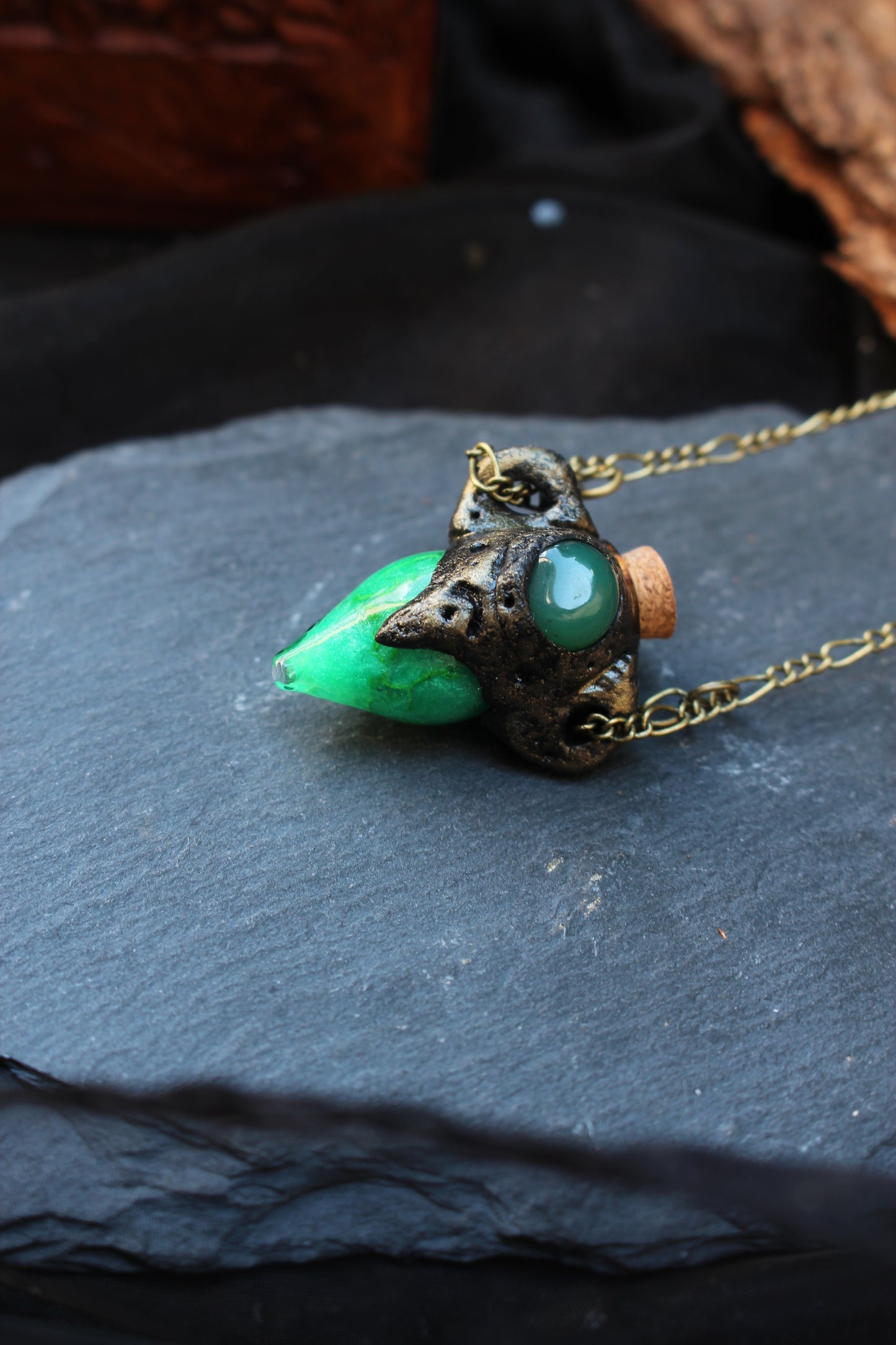 Handcrafted glow in the dark potion pendant