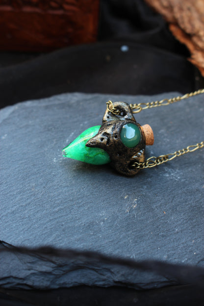 Handcrafted glow in the dark potion pendant