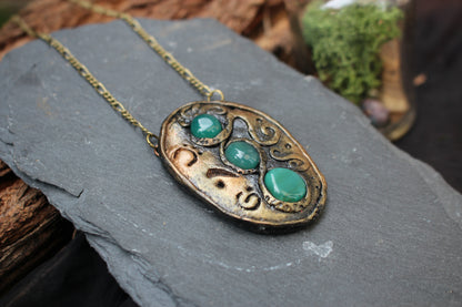 Rustic fantasy pendant with natural green agate gemstones and rune symbols