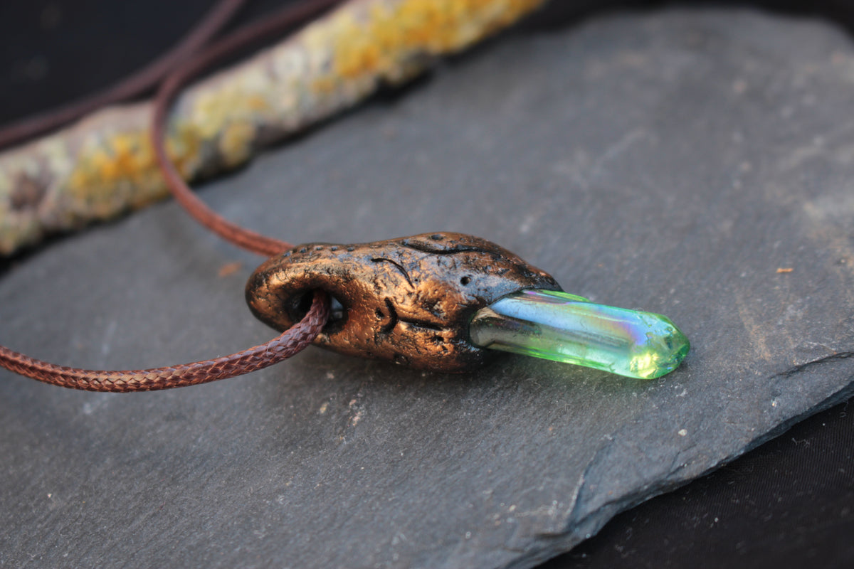Handmade green fantasy pendant with bronze finish