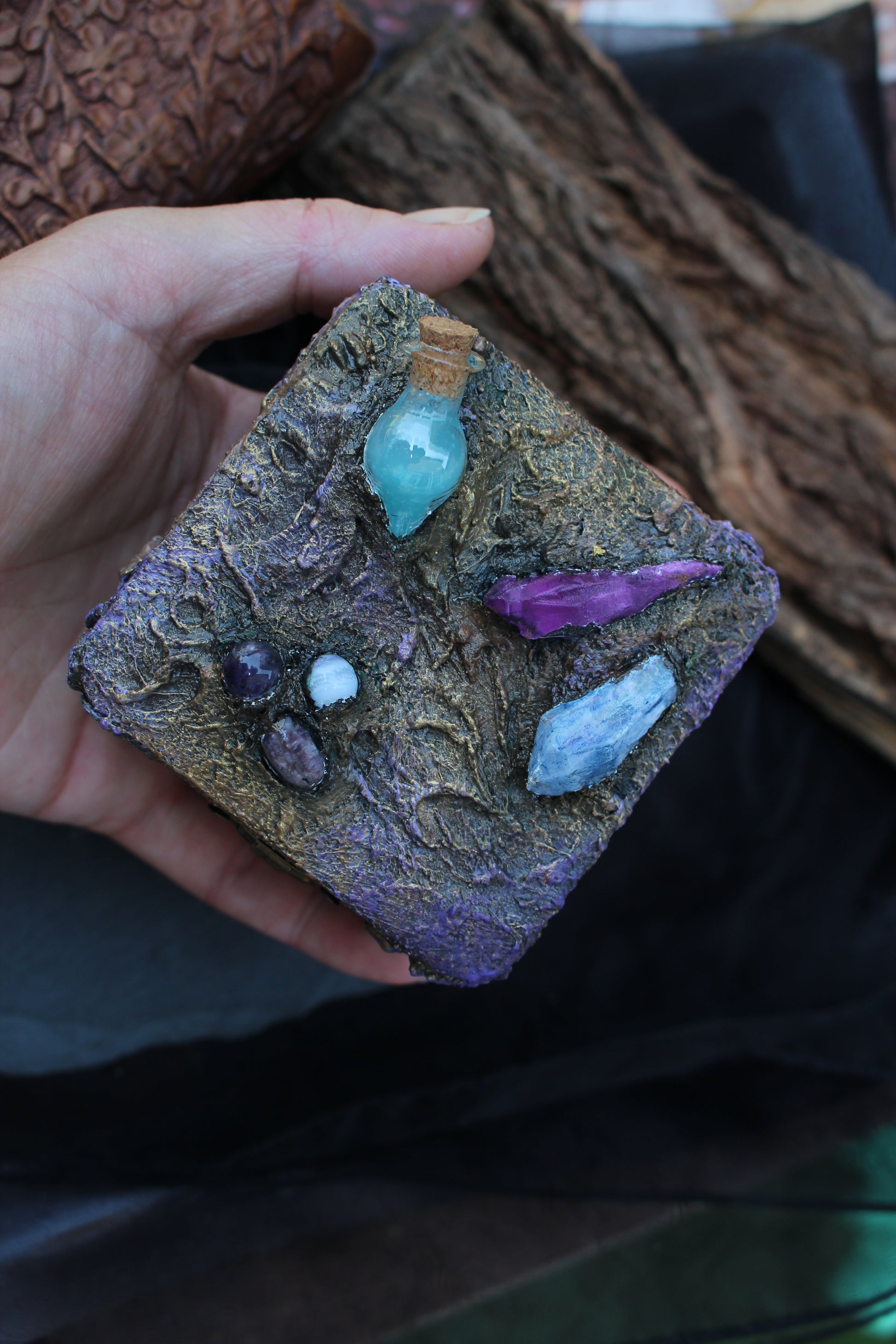 Close-up of handcrafted witchy wooden treasure box details