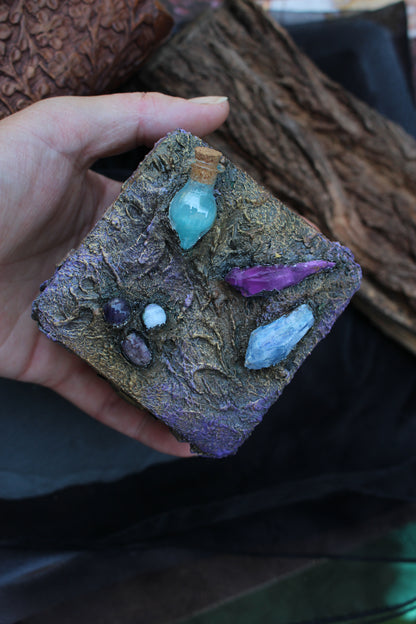 Close-up of handcrafted witchy wooden treasure box details