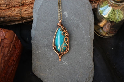 Artisan blue agate crystal jewelry featuring elegant copper wire craftsmanship