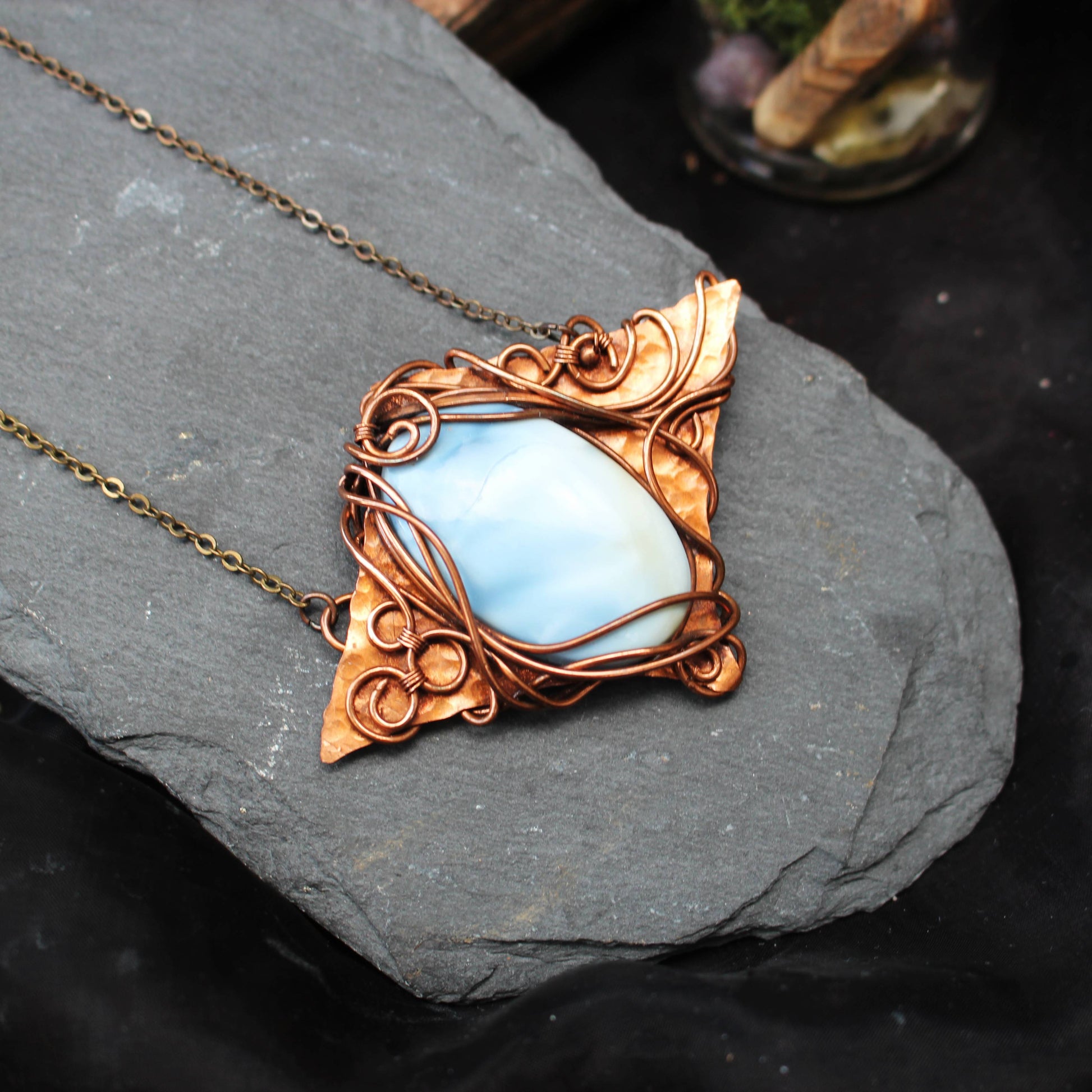 Blue opal gemstone pendant wrapped in copper wire handcrafted necklace