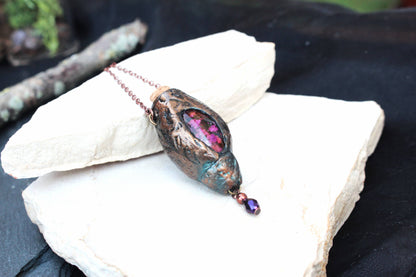Handmade fantasy necklace with a detailed forest-inspired pendant